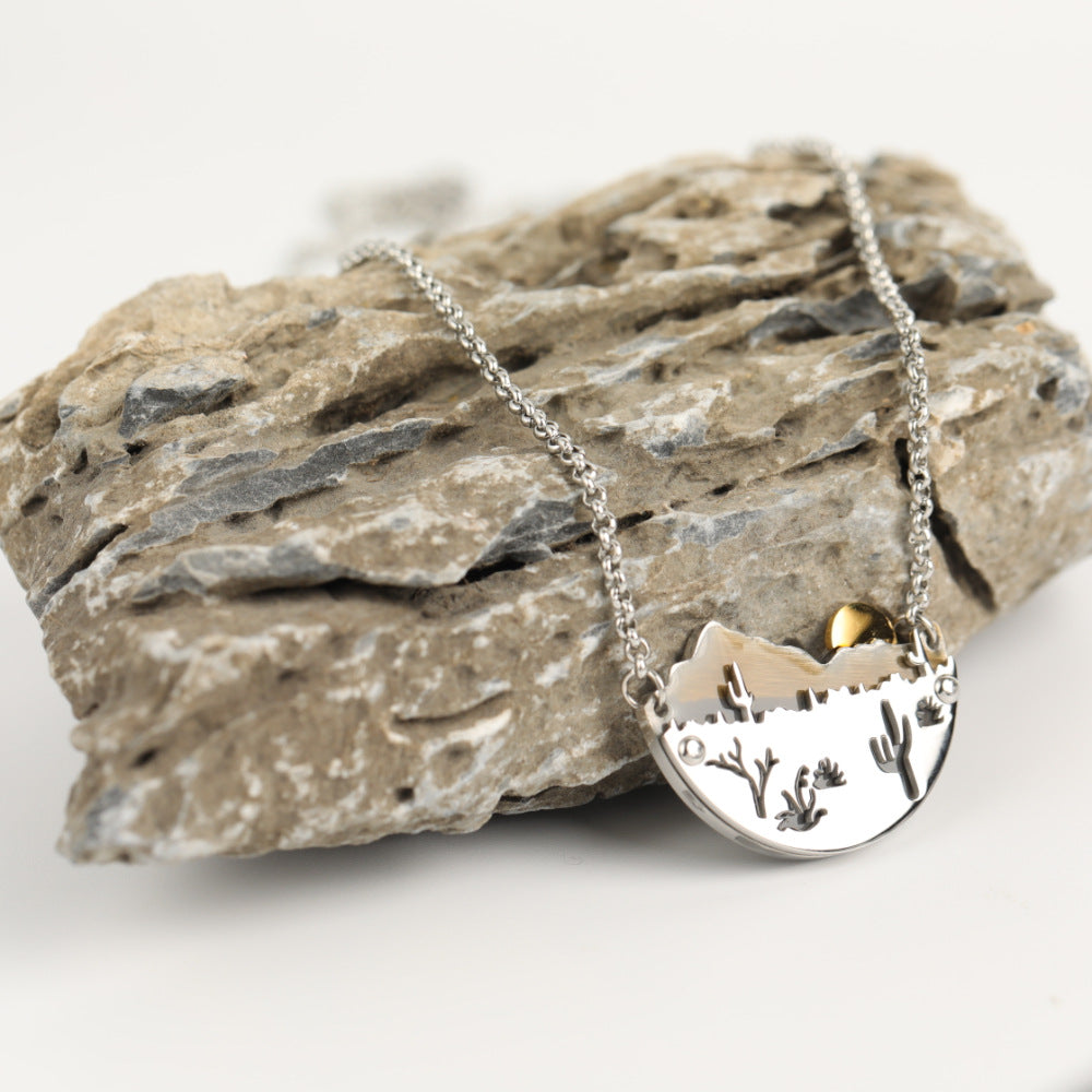 Venta al por mayor Sunset Mountains colgante collar de acero inoxidable